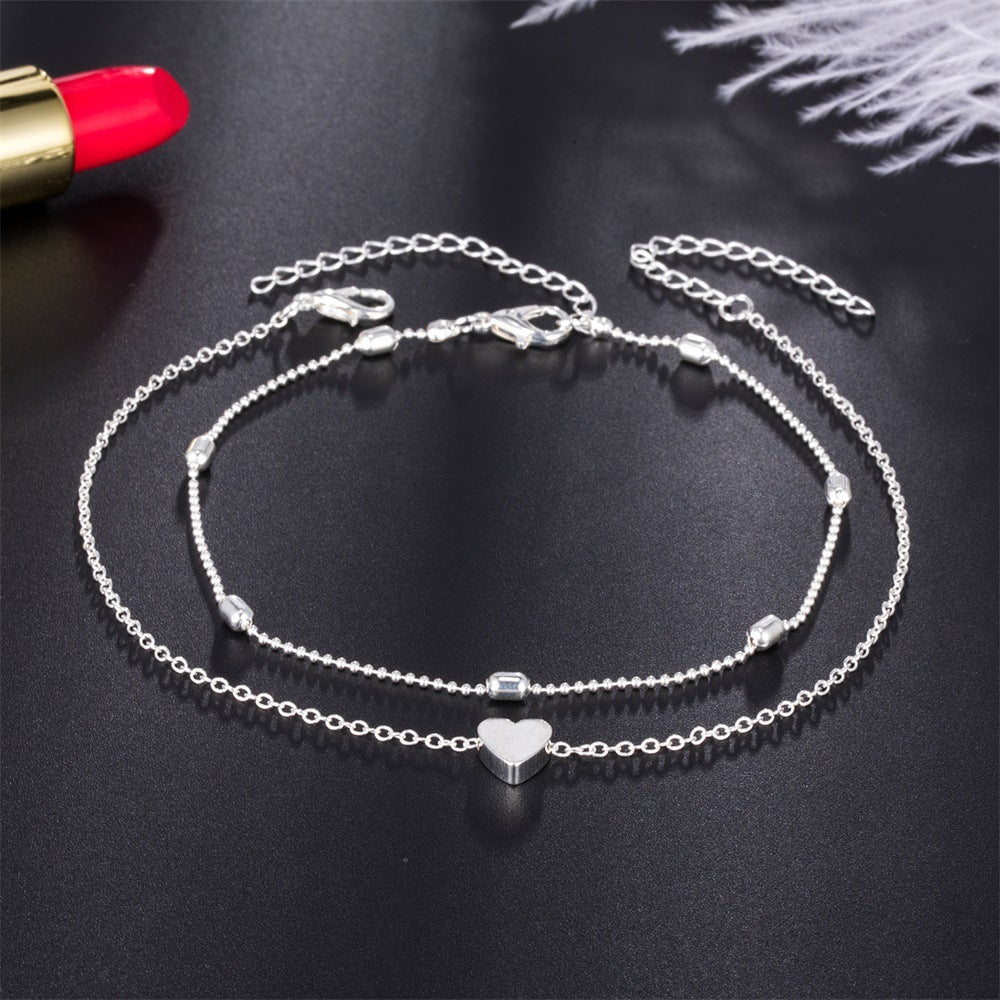 Bracelet de Cheville "Ocean-Heart" – Double Chaîne Rétro & Pendentif Cœur Gravé