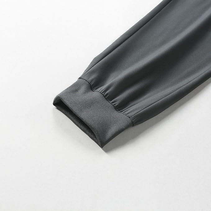 Pantalon de sport pour homme avec taille élastique et poches zippées pour la course à pied et la randonnée
Taille: L