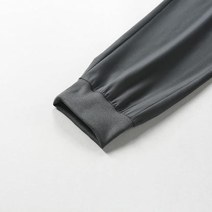 Pantalon de sport pour homme avec taille élastique et poches zippées pour la course à pied et la randonnée
Taille: L