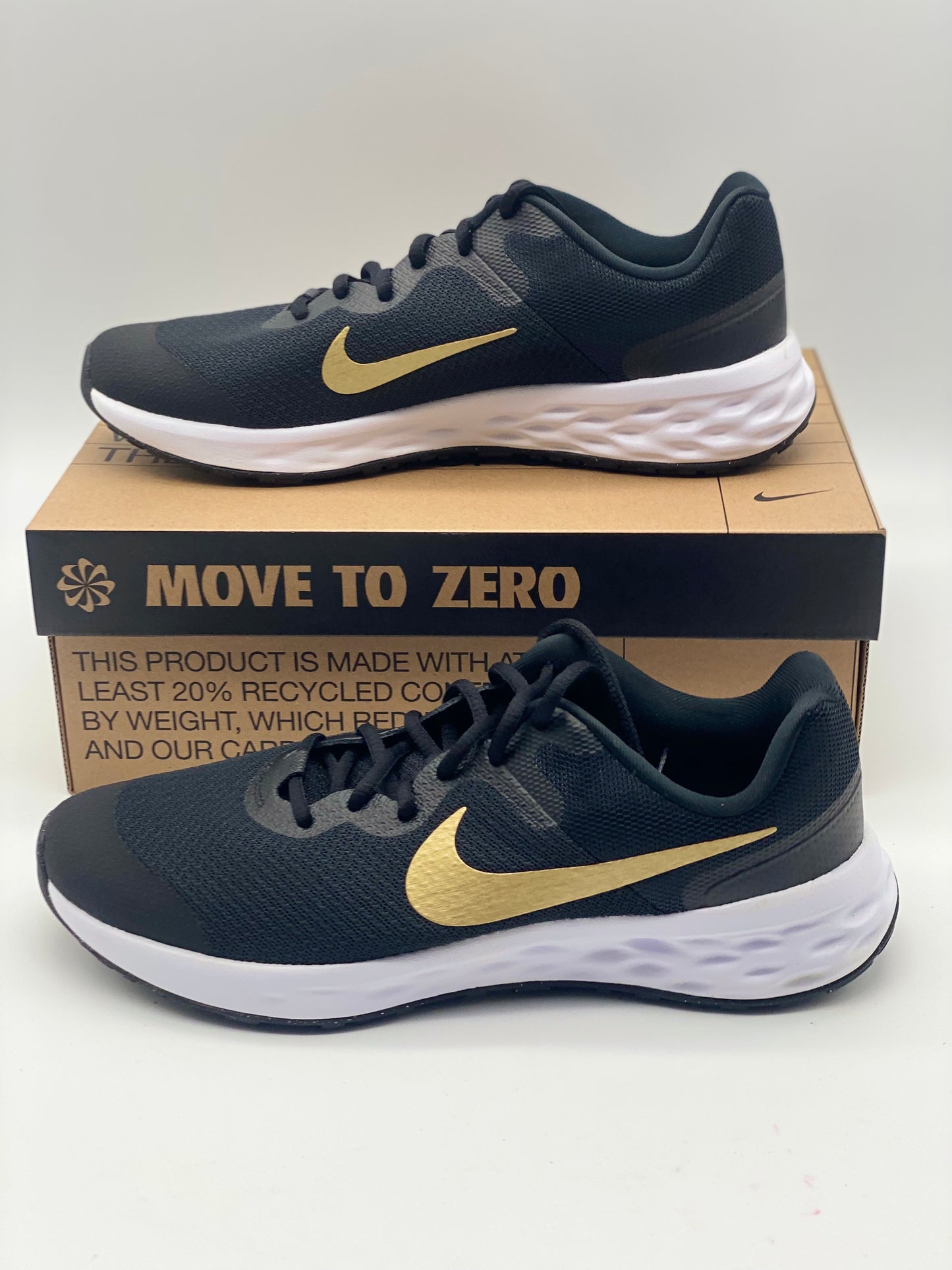 Baskets Nike Revolution 6 Next Nature noir / or enfant fille