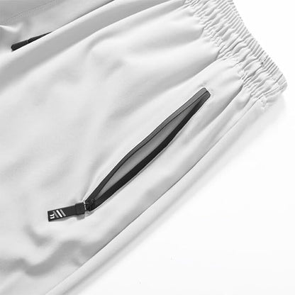 Pantalon décontracté pour homme - Pantalon de jogging léger à séchage rapide avec poches zippées