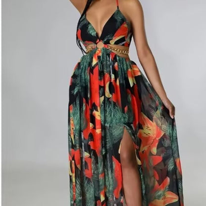 Robe "Flora-Chain" – Coupe Évasée, Dos Nu & Découpes Latérales avec Détail Chaîne
L'élégance florale sublimée par une touche d'audace