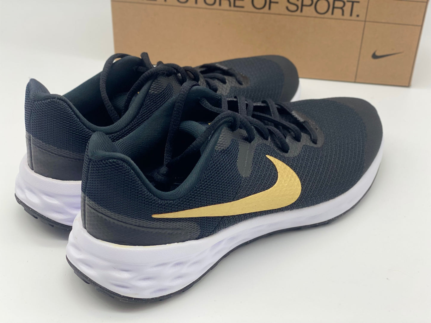 Baskets Nike Revolution 6 Next Nature noir / or enfant fille