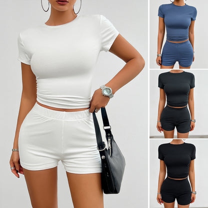 Ensemble de sport mince de couleur unie d’été 2 pièces T-shirt à col rond à manches courtes et short élastique Vêtements pour femmes à la mode