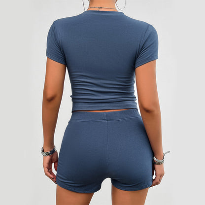 Ensemble de sport mince de couleur unie d’été 2 pièces T-shirt à col rond à manches courtes et short élastique Vêtements pour femmes à la mode